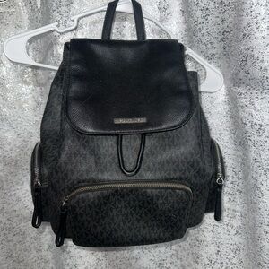 Michael Kors Black and Gray Backpack with Flap Closure